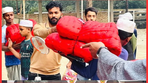 ফরিদপুরে এতিম ও দরিদ্র শিক্ষার্থীদের শীতবস্ত্র বিতরণ