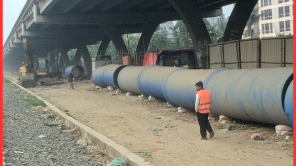 খিলক্ষেতে এলিভেটেড এক্সপ্রেসওয়ের নিচে ঢাকা ওয়াসার পাইপলাইন কাজ চলমান